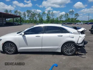 2017 Lincoln MKZ Hybrid Select z VIN 3LN6L5LUXHR600982, wystawiony jako IAAI lot #42266287 z przebiegiem 201 450 mil mil oraz . Historia ofert i sprzedaży dostępna na DreamBid. Obrazek 14.