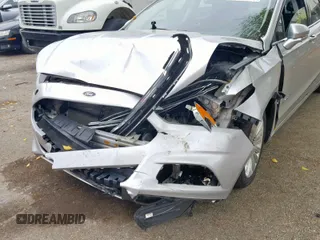 2016 Ford Fusion SE Hybrid with VIN 3FA6P0LUXGR397589, listed as a Copart auction lot 58180612 with 72,400 mi miles and Salvage Title. Bid and sale history available at carsss.com. Image 9.