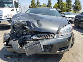 2014 Chevrolet Impala LS with VIN 2G1WA5E37E1105968, listed as a Copart auction lot 61287875 with 73,497 mi miles and Salvage title. Bid and sale history available at DreamBid. Image 5.