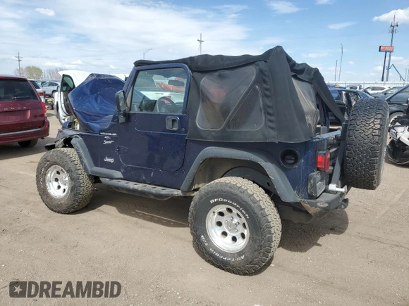 2002 Jeep Wrangler Sport z VIN 1J4FA49SX2P772609, wystawiony jako Copart lot #55893425 z przebiegiem 157 653 mil mil oraz Szkoda całkowita • Salvage title. Historia ofert i sprzedaży dostępna na DreamBid. Obrazek 2.