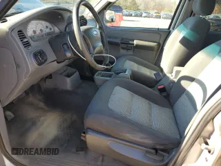 2005 Ford Explorer Sport Trac XLS с VIN 1FMZU77K75UA78704, выставлен на аукционе Copart как лот 41428235 с пробегом 148 689 миль миль и Списание • Salvage title. История ставок и продаж доступна на DreamBid. Изображение 7.