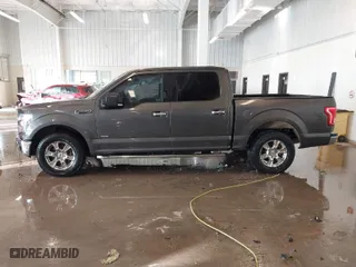 2015 Ford F-150 XL with VIN 1FTEW1CG2FKE36882, listed as a IAAI auction lot 41364096 with 143,167 mi miles. Bid and sale history available at carsss.com. Image 14.