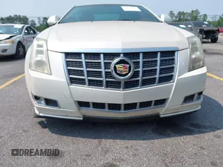 2012 Cadillac CTS Premium z VIN 1G6DP1E3XC0108543, wystawiony jako IAAI lot #42413547 z przebiegiem 80 570 mil mil oraz . Historia ofert i sprzedaży dostępna na DreamBid. Obrazek 6.