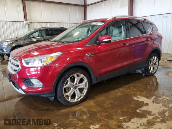 2019 Ford Escape Titanium with VIN 1FMCU9J98KUB93072, listed as a Copart auction lot 61931205 with 64,412 mi miles and Salvage title. Bid and sale history available at DreamBid. Image 1.