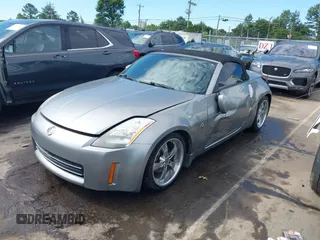 2004 Nissan 350Z Touring z VIN JN1AZ36A94T013851, wystawiony jako IAAI lot #42335966 z przebiegiem 180 814 mil mil oraz . Historia ofert i sprzedaży dostępna na DreamBid. Obrazek 2.