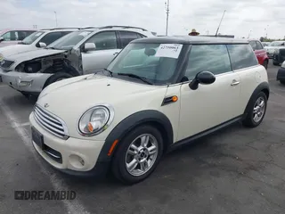 2013 MINI Hardtop with VIN WMWSU3C51DT687156, listed as a IAAI auction lot 42750063 with 93,002 mi miles and . Bid and sale history available at DreamBid. Image 2.