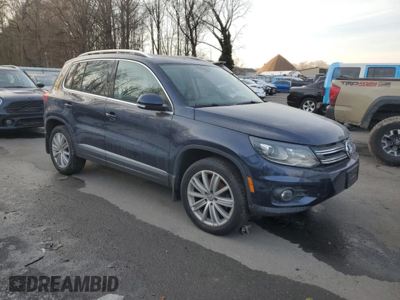 2016 Volkswagen Tiguan R-Line with VIN WVGBV7AX5GW573820, listed as a Copart auction lot 42363515 with 124,283 mi miles and Salvage Title. Bid and sale history available at DreamBid. Image 4.