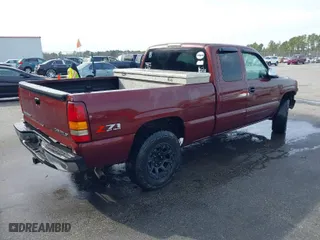 2001 Chevrolet Silverado 1500 LS with VIN 1GCEK19T41E124392, listed as a IAAI auction lot 41535247 with 306,514 mi miles. Bid and sale history available at carsss.com. Image 4.