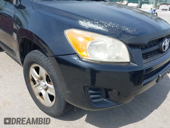 2009 Toyota RAV4 with VIN JTMZF33V29D004278, listed as a IAAI auction lot 42083497 with 218,217 mi miles. Bid and sale history available at carsss.com. Image 12.