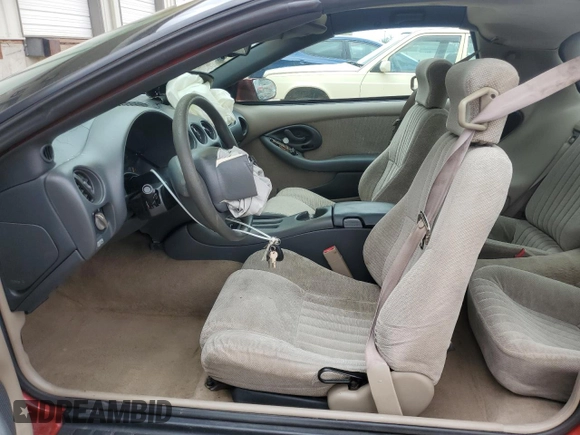 1998 Pontiac Firebird Firebird z VIN 2G2FS22K4W2210899, wystawiony jako Copart lot #51608195 z przebiegiem 99 553 mil mil oraz Szkoda całkowita • Salvage title. Historia ofert i sprzedaży dostępna na DreamBid. Obrazek 7.