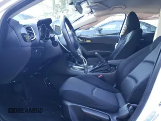 2016 Mazda 3 i Sport with VIN JM1BM1K71G1310840, listed as a Copart auction lot 76546654 with 83,971 mi miles and Salvage Title. Bid and sale history available at DreamBid. Image 7.