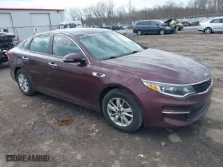 2016 Kia Optima LX with VIN 5XXGT4L36GG108599, listed as a IAAI auction lot 42065639 with 127,387 mi miles. Bid and sale history available at carsss.com. Image 1.