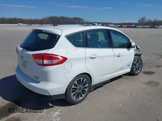 2017 Ford C-Max Energi Titanium with VIN 1FADP5FU4HL101319, listed as a IAAI auction lot 41837912 with 158,536 mi miles. Bid and sale history available at carsss.com. Image 4.