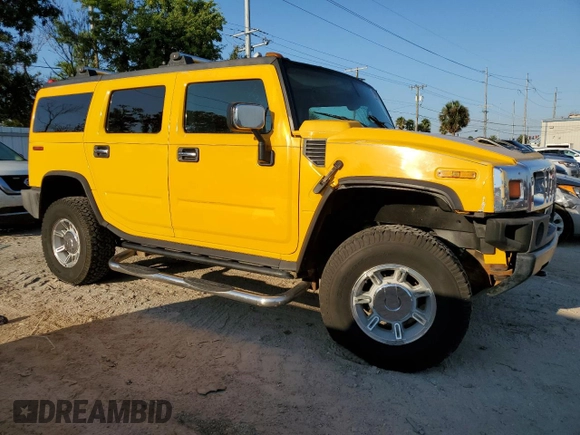 2003 Hummer H2 with VIN 5GRGN23U23H145779, listed as a Copart auction lot 72048564 with 268,329 mi miles and Clean Title. Bid and sale history available at carsss.com. Image 4.