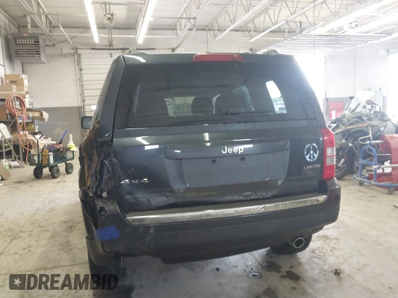 2014 Jeep Patriot Limited with VIN 1C4NJRCB7ED684811, listed as a IAAI auction lot 41833010 with 74,820 mi miles and . Bid and sale history available at carsss.com. Image 6.