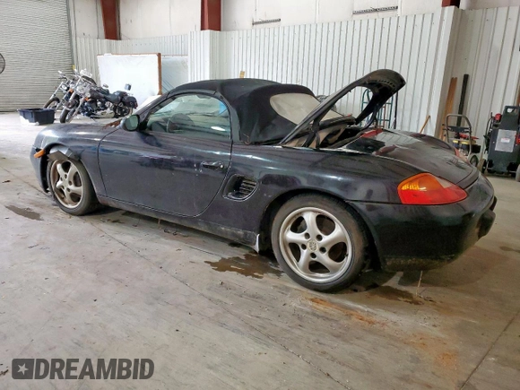 1999 Porsche Boxster z VIN WP0CA2988XU623383, wystawiony jako Copart lot #60567895 z przebiegiem Nie podano mil oraz Czysty tytuł • Clean title. Historia ofert i sprzedaży dostępna na DreamBid. Obrazek 2.