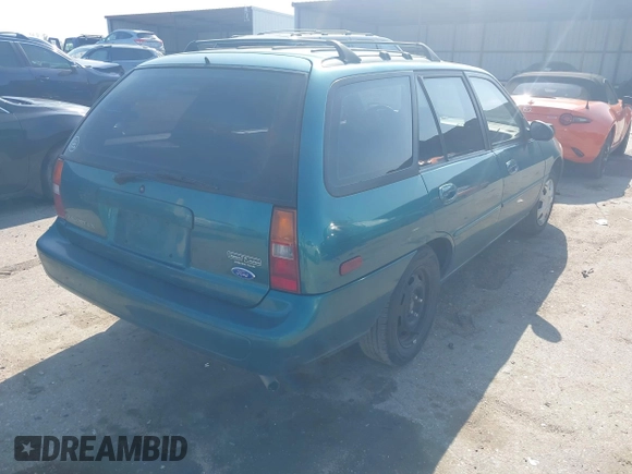 1997 Ford Escort LX z VIN 3FALP15P7VR158272, wystawiony jako IAAI lot #41833216 z przebiegiem 148 170 mil mil oraz . Historia ofert i sprzedaży dostępna na DreamBid. Obrazek 4.