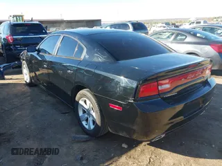 2014 Dodge Charger SE with VIN 2C3CDXBG9EH116776, listed as a IAAI auction lot 41465565 with 128,319 mi miles. Bid and sale history available at carsss.com. Image 3.