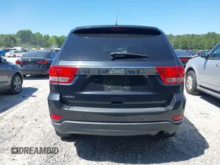 2012 Jeep Grand Cherokee Laredo with VIN 1C4RJEAG9CC223167, listed as a IAAI auction lot 42136098 with 152,715 mi miles. Bid and sale history available at carsss.com. Image 16.