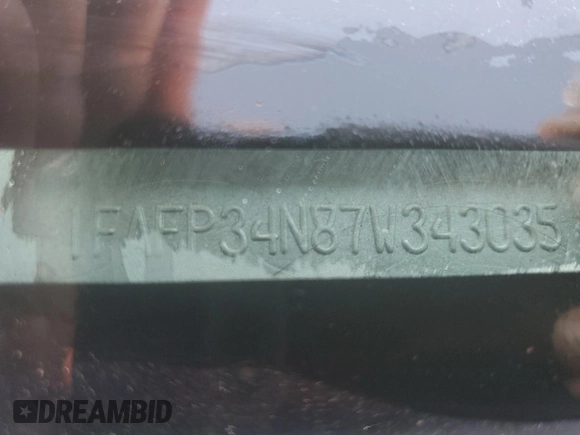 2007 Ford Focus S with VIN 1FAFP34N87W343035, listed as a Copart auction lot 63419335 with Not provided miles and Salvage title. Bid and sale history available at DreamBid. Image 12.