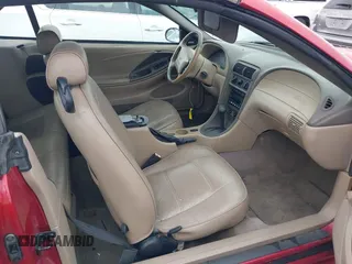 2004 Ford Mustang Deluxe with VIN 1FAFP44624F197158, listed as a IAAI auction lot 41712280 with 136,762 mi miles. Bid and sale history available at carsss.com. Image 5.
