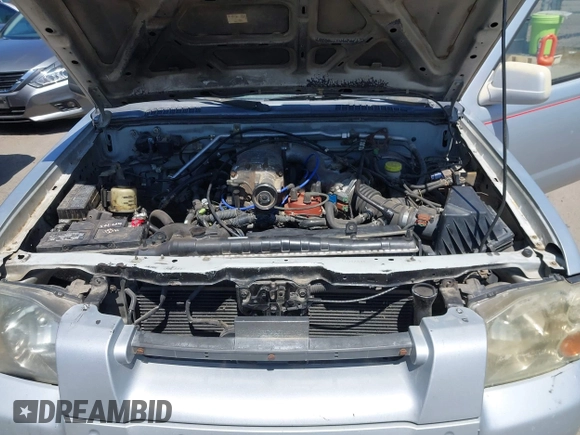 2001 Nissan Frontier SE Desert Runner z VIN 1N6ED26T51C362345, wystawiony jako IAAI lot #42324055 z przebiegiem 233 809 mil mil oraz . Historia ofert i sprzedaży dostępna na DreamBid. Obrazek 10.