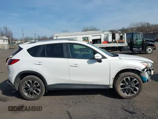 2016 Mazda CX-5 Grand Touring with VIN JM3KE4DYXG0836692, listed as a IAAI auction lot 41812584 with 119,302 mi miles. Bid and sale history available at carsss.com. Image 13.