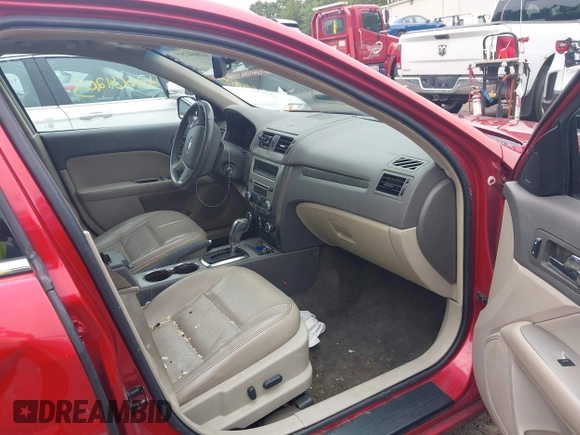 2012 Ford Fusion SEL z VIN 3FAHP0JAXCR221377, wystawiony jako IAAI lot #42664205 z przebiegiem 213 881 mil mil oraz . Historia ofert i sprzedaży dostępna na DreamBid. Obrazek 5.