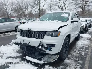 2017 Jeep Grand Cherokee Laredo with VIN 1C4RJFAG2HC951071, listed as a IAAI auction lot 41536568 with 99,941 mi miles. Bid and sale history available at carsss.com. Image 17.