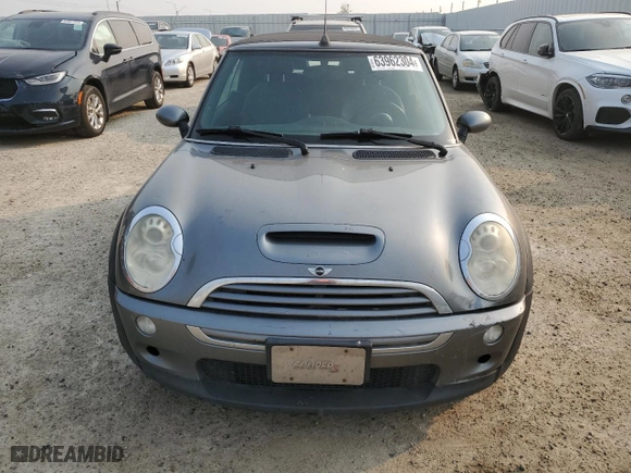 2005 MINI Cooper Convertible S with VIN WMWRH33535TF83436, listed as a Copart auction lot 63962304 with 246,932 mi miles and Salvage Title. Bid and sale history available at carsss.com. Image 5.