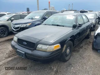 2010 Ford Police Interceptor with VIN 2FABP7BV3AX143703, listed as a IAAI auction lot 42005604 with 93,009 mi miles and . Bid and sale history available at DreamBid. Image 6.