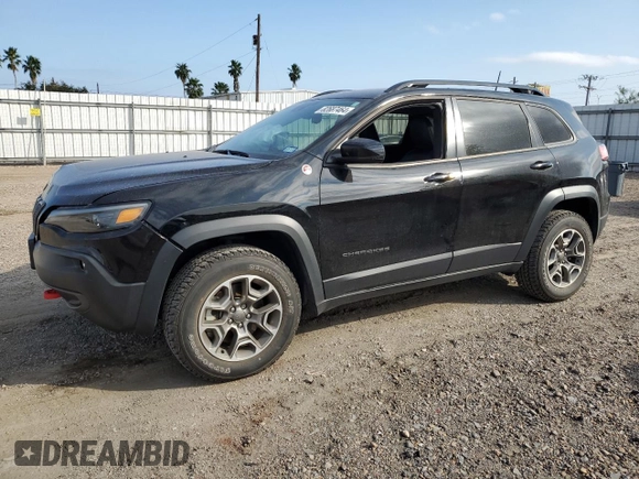2022 Jeep Cherokee Trailhawk with VIN 1C4PJMBX8ND554044, listed as a Copart auction lot 82687464 with 13,353 mi miles and Salvage Title. Bid and sale history available at carsss.com. Image 1.