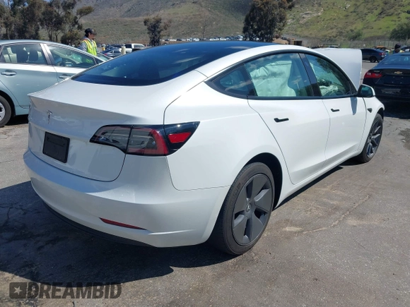 2023 Tesla Model 3 with VIN 5YJ3E1EA4PF462627, listed as a IAAI auction lot 41750103 with 38,463 mi miles and . Bid and sale history available at carsss.com. Image 4.