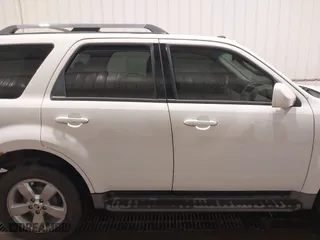 2011 Mercury Mariner Premier with VIN 4M2CN9HG3BKJ02026, listed as a IAAI auction lot 40254703 with 99,000 mi miles. Bid and sale history available at carsss.com. Image 13.