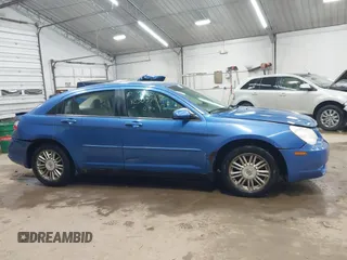 2007 Chrysler Sebring Touring z VIN 1C3LC56K57N508248, wystawiony jako IAAI lot #42305748 z przebiegiem 174 621 mil mil oraz . Historia ofert i sprzedaży dostępna na DreamBid. Obrazek 13.
