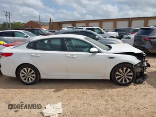 2017 Kia Optima LX z VIN 5XXGT4L39HG133028, wystawiony jako IAAI lot #41957226 z przebiegiem 92 366 mil mil oraz . Historia ofert i sprzedaży dostępna na DreamBid. Obrazek 13.