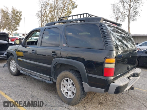2004 Chevrolet Tahoe LS with VIN 1GNEK13T64R265302, listed as a IAAI auction lot 41445237 with 242,840 mi miles. Bid and sale history available at carsss.com. Image 3.