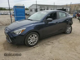 2016 Scion iA z VIN 3MYDLBZV5GY130652, wystawiony jako Copart lot #57396295 z przebiegiem 22 603 mil mil oraz Szkody całkowita. Historia ofert i sprzedaży dostępna na DreamBid. Obrazek 1.