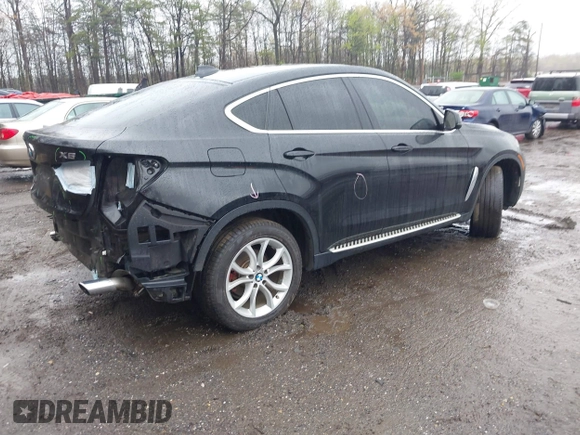 2015 BMW X6 xDrive35i with VIN 5UXKU2C53F0N76799, listed as a IAAI auction lot 41946628 with 173,607 mi miles. Bid and sale history available at carsss.com. Image 4.