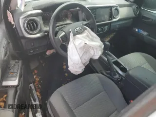 2023 Toyota Tacoma SR5 z VIN 3TYAZ5CN7PT042367, wystawiony jako Copart lot #60100495 z przebiegiem Nie podano mil oraz Nie do naprawy • Non repairable. Historia ofert i sprzedaży dostępna na DreamBid. Obrazek 8.