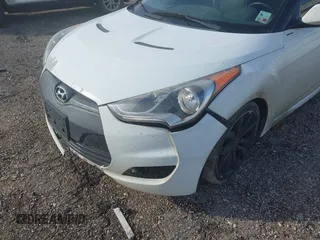 2013 Hyundai Veloster w/Gray Int with VIN KMHTC6AD4DU140121, listed as a IAAI auction lot 41410252 with 202,596 mi miles and . Bid and sale history available at DreamBid. Image 6.