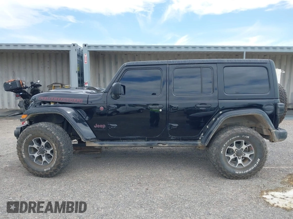 2022 Jeep Wrangler Unlimited Rubicon with VIN 1C4HJXFN2NW134024, listed as a IAAI auction lot 42248188 with 41,899 mi miles and . Bid and sale history available at DreamBid. Image 14.