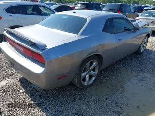 2014 Dodge Challenger R/T z VIN 2C3CDYBT9EH139932, wystawiony jako IAAI lot #42261252 z przebiegiem 95 241 mil mil oraz . Historia ofert i sprzedaży dostępna na DreamBid. Obrazek 4.