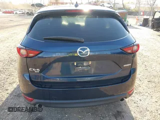 2020 Mazda CX-5 Grand Touring with VIN JM3KFBDM4L0779284, listed as a IAAI auction lot 42060936 with 9,227 mi miles. Bid and sale history available at carsss.com. Image 16.