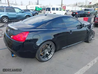 2014 Infiniti Q60 Coupe Journey with VIN JN1CV6EK1EM111283, listed as a IAAI auction lot 41448127 with 96,921 mi miles. Bid and sale history available at carsss.com. Image 4.