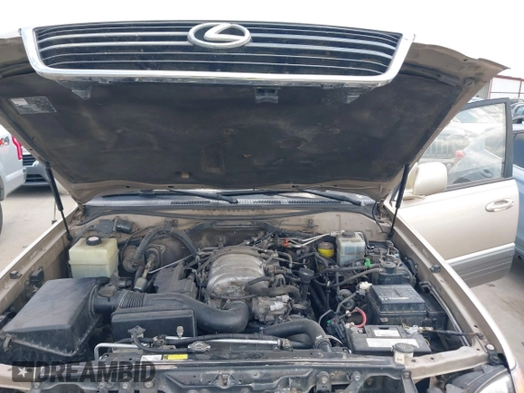 2001 Lexus LX 470 with VIN JTJHT00W713511796, listed as a IAAI auction lot 42222574 with 297,427 mi miles and . Bid and sale history available at carsss.com. Image 10.