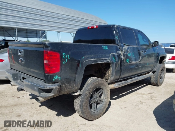 2014 Chevrolet Silverado 1500 LTZ with VIN 3GCUKSEC9EG325632, listed as a IAAI auction lot 41952756 with 196,779 mi miles and . Bid and sale history available at DreamBid. Image 4.