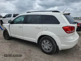 2014 Dodge Journey SE with VIN 3C4PDCAB7ET240936, listed as a Copart auction lot 55115645 with 242,155 mi miles and Salvage title. Bid and sale history available at DreamBid. Image 2.
