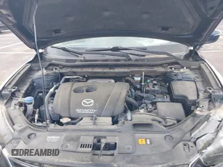 2016 Mazda CX-5 Sport with VIN JM3KE2BY3G0740488, listed as a IAAI auction lot 42000449 with 43,009 mi miles. Bid and sale history available at carsss.com. Image 10.