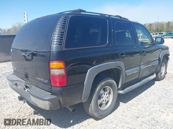2002 Chevrolet Tahoe LT z VIN 1GNEC13Z42R245581, wystawiony jako IAAI lot #41810788 z przebiegiem 228 166 mil mil oraz . Historia ofert i sprzedaży dostępna na DreamBid. Obrazek 4.